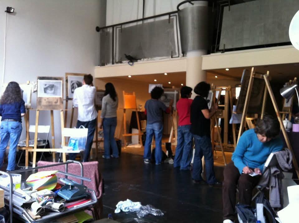 Students working at easels in Cristian's atelier